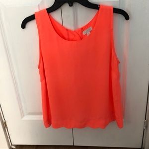 Scalloped coral blouse from Charming Charlie's